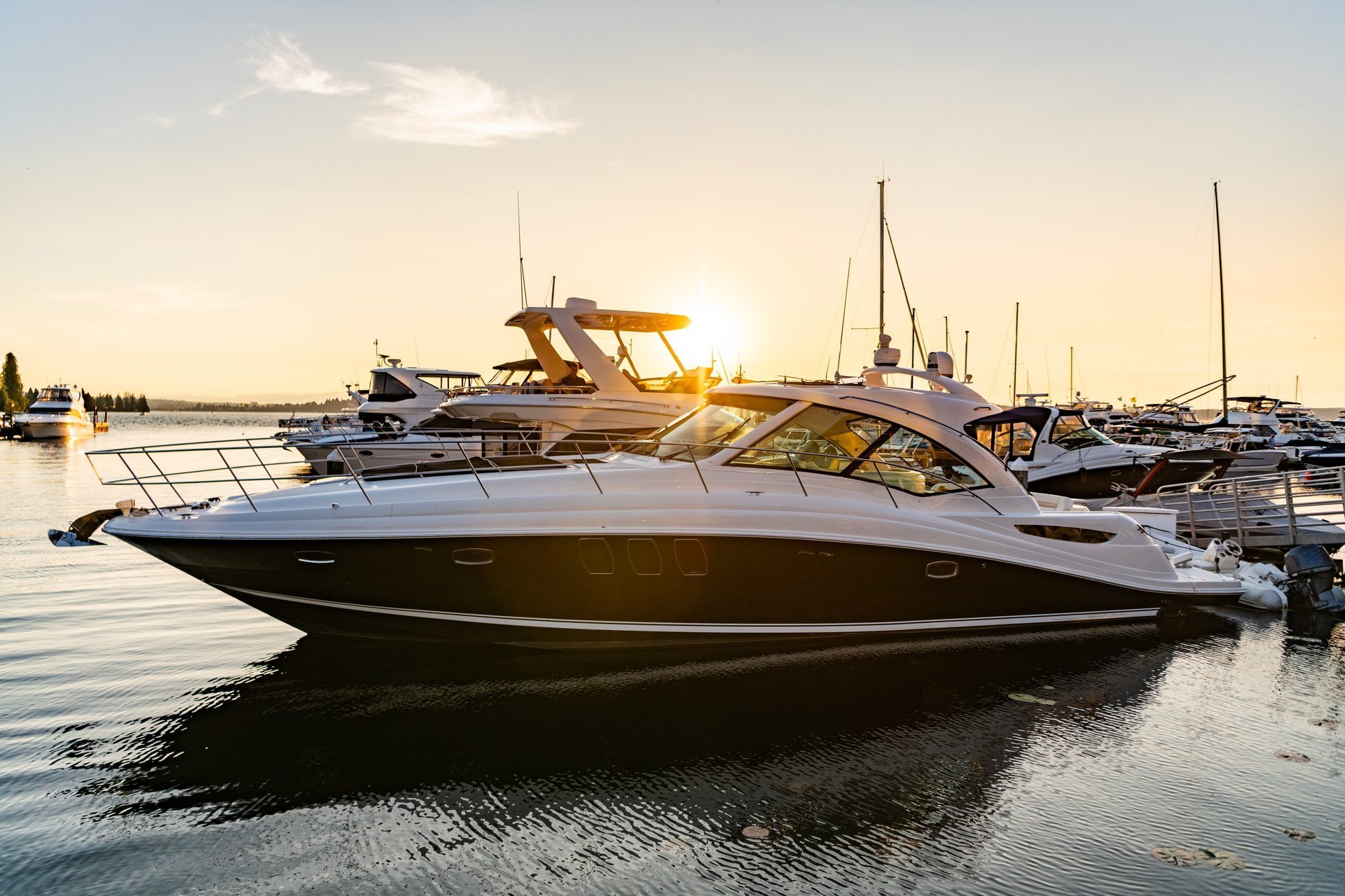Luxury yacht in evening sunset at marina