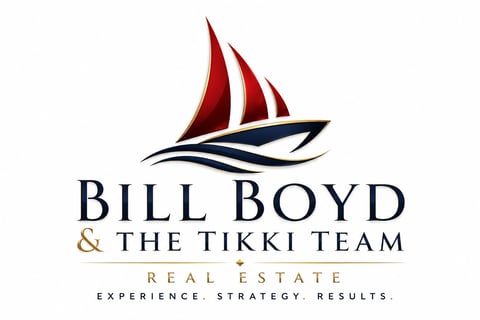 Bill Boyd and The Tikki Team real estate logo featuring a red and blue sailboat with company name and tagline